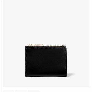 Barely used Michael Kors Small envelope wallet